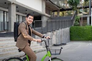The businessman eco friendly transportation, cycling through the city avenues to go to work. sustainable lifestyle concept photo