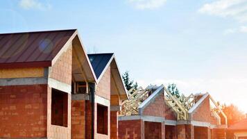 Single-family house under construction in an development estate of small single-family houses. photo