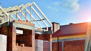 Single-family house under construction in an development estate of small single-family houses. photo