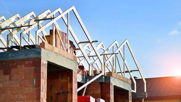 Single-family house under construction in an development estate of small single-family houses. photo