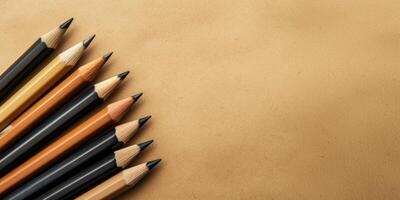 AI generated Simple pencils on empty beige pastel background with copy space. School and office supplies photo