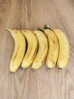 Ripe bananas. Exotic tropical yellow fruit. Banana symbol of health care and wellbeing. photo