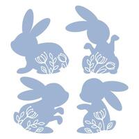 Set of blue silhouettes of Easter bunnies with cut out flower silhouettes vector