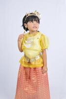 a 10 year old Indonesian girl wearing traditional clothes from Palembang photo