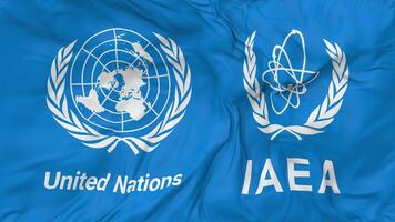 internacional atómico energía agencia, OIEA y unido naciones, Naciones Unidas banderas juntos sin costura bucle fondo, serpenteado bache textura paño ondulación lento movimiento, 3d representación video