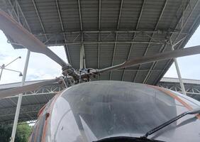 a helicopter in the hangar photo