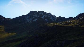 A majestic mountain peak towering above the clouds video