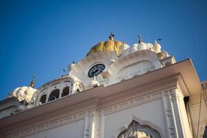 View of details of architecture inside Golden Temple - Harmandir Sahib in Amritsar, Punjab, India, Famous indian sikh landmark, Golden Temple, the main sanctuary of Sikhs in Amritsar, India photo