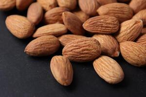 Closeup of almond, nut food, brown almonds photo