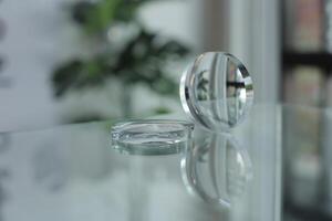 Glasses lenses on the table in optic, eyeglasses lenses photo