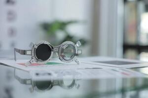 Trial frame eye test, eye exam Phoropter, glasses lenses eye check photo