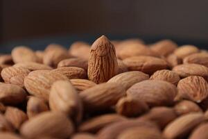 Closeup of almond, nut food, brown almonds photo