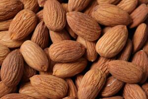 Closeup of almond, nut food, brown almonds photo