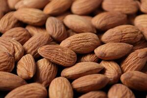 Closeup of almond, nut food, brown almonds photo