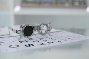 Trial frame eye test, eye exam Phoropter, glasses lenses eye check photo