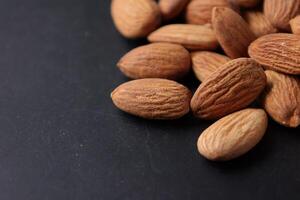 Closeup of almond, nut food, brown almonds photo