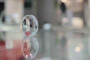 Glasses lenses on the table in optic, eyeglasses lenses photo