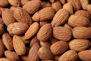 Closeup of almond, nut food, brown almonds photo