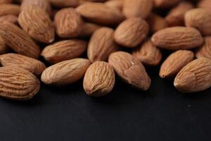 Closeup of almond, nut food, brown almonds photo