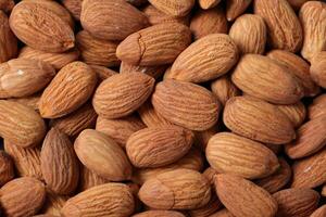 Closeup of almond, nut food, brown almonds photo