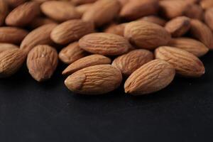 Closeup of almond, nut food, brown almonds photo