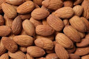 Closeup of almond, nut food, brown almonds photo