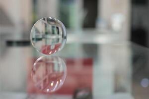 Glasses lenses on the table in optic, eyeglasses lenses photo