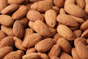 Closeup of almond, nut food, brown almonds photo