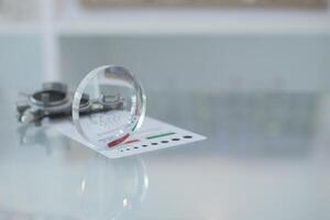 Glasses lenses on the table in optic, eyeglasses lenses photo