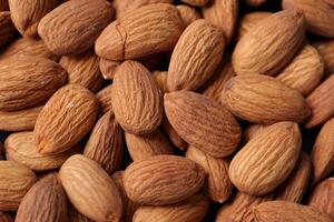 Closeup of almond, nut food, brown almonds photo