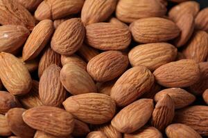 Closeup of almond, nut food, brown almonds photo