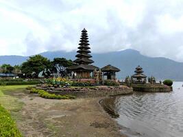 Pura Ulun Danu Bratan, famous temple on the lake, Bedugul, Bali, Indonesia photo