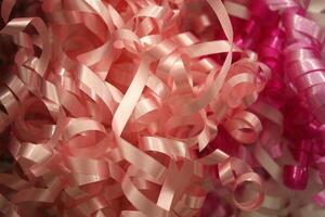 festivo rizado cinta en sombras de rosado foto