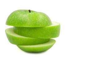 Sliced green apple over white background. photo