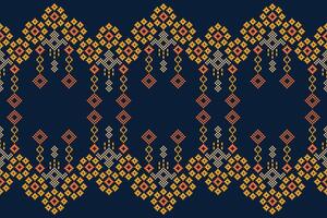 Traditional ethnic motifs ikat geometric fabric pattern cross stitch.Ikat embroidery Ethnic oriental Pixel navy blue background. Abstract,vector,illustration. Texture,scarf,decoration,wallpaper. vector