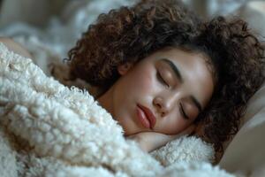 AI generated Woman peacefully sleeping in bed, enveloped by a luxurious white fluffy blanket, showcasing a contemporary DIY aesthetic with African influence photo