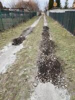 Construction of road filling with gravel photo