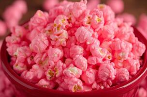 AI generated Red bowl with pink popcorn photo