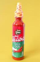 Palembang, Indonesia, January 5, 2024,  a bottle of sambal or sambal with the brand  dua belibis photo