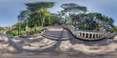 full seamless spherical 360 hdri panorama on old concrete staircase, remains of an ancient more developed civilization in jungles of India in equirectangular projection, for VR virtual reality content photo