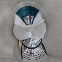 abstractly twisted into a spherical 360 panorama interior of a modern office with a hall staircase and panoramic windows photo