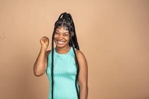 Portrait of surprised african girl opened mouth in amazement photo