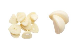 Top view set of peeled garlic cloves and slices isolated on white background with clipping path photo