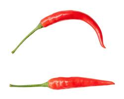 Top view and flat lay of fresh curved red chili peppers in set isolated on white background with clipping path photo