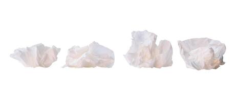 Front view set of crumpled tissue paper balls after use in toilet or restroom isolated on white background with clipping path photo