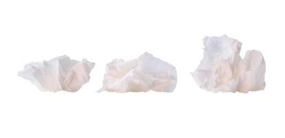 Front view set of crumpled tissue paper balls after use in toilet or restroom isolated on white background with clipping path photo