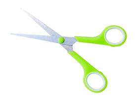 Top view of a pair of multipurpose scissors with green handle isolated on white background with clipping path photo