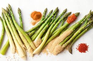 AI generated Bunch of raw asparagus stems with different spices and ingredients on white background photo