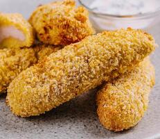 Chicken golden nuggets in plate photo