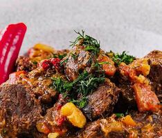 beef goulash with red pepper close up photo